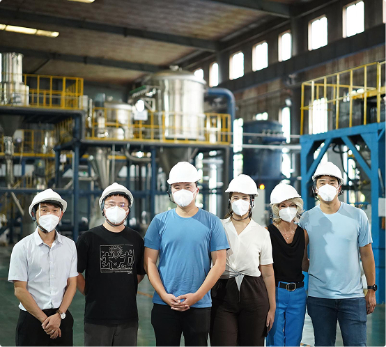 The UNIGRID team in hard hats at the cathode production plant