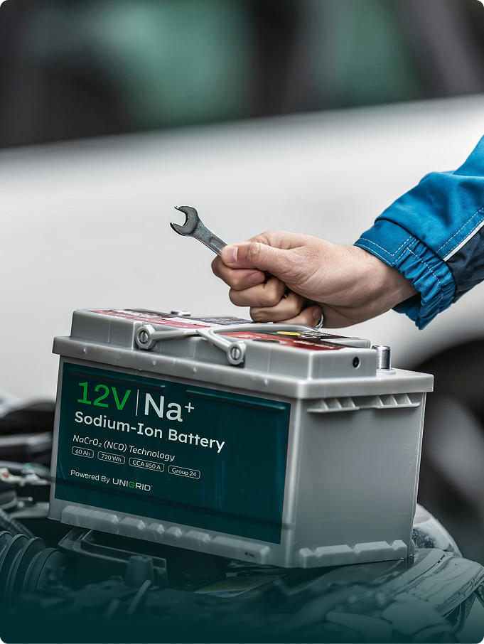 Na+ Fleet 12V starter battery under a car hood